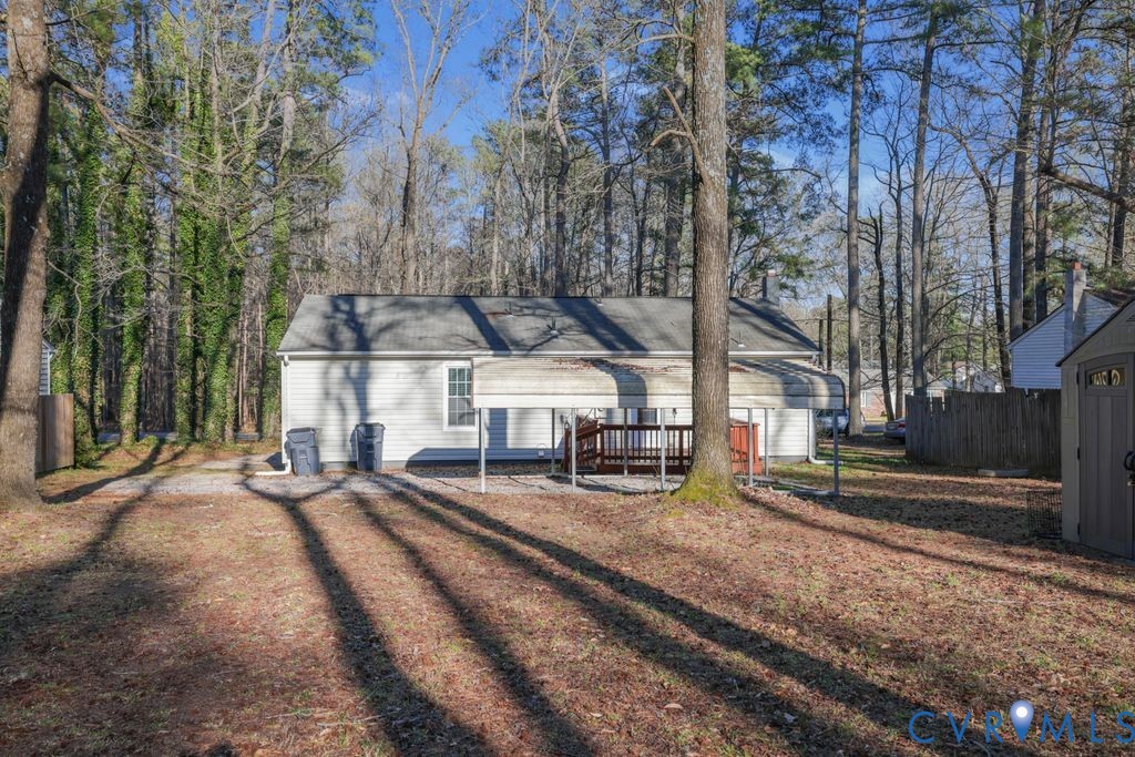 21104 Matoaca Road Petersburg, VA 23803 - Photo 20 of 22 a view of a house with large area and car parked