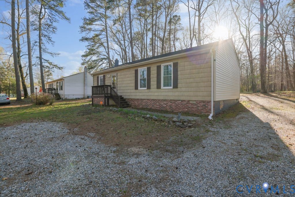 21104 Matoaca Road Petersburg, VA 23803 - Photo 3 of 22 a view of a house with a yard