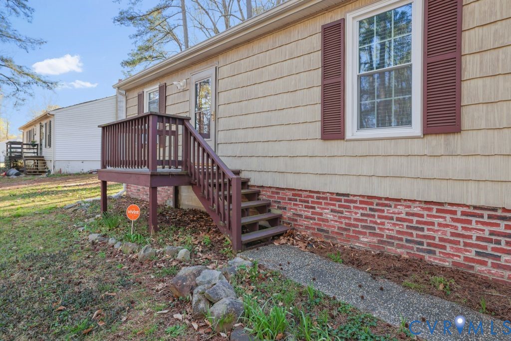 21104 Matoaca Road Petersburg, VA 23803 - Photo 4 of 22 a view of a house with a yard