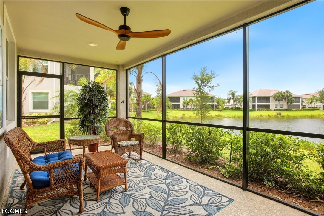 3751 Pebblebrook Ridge Court, Unit 101 Fort Myers, FL 33905 - Photo 2 of 48 a view of a porch with furniture and a floor to ceiling window