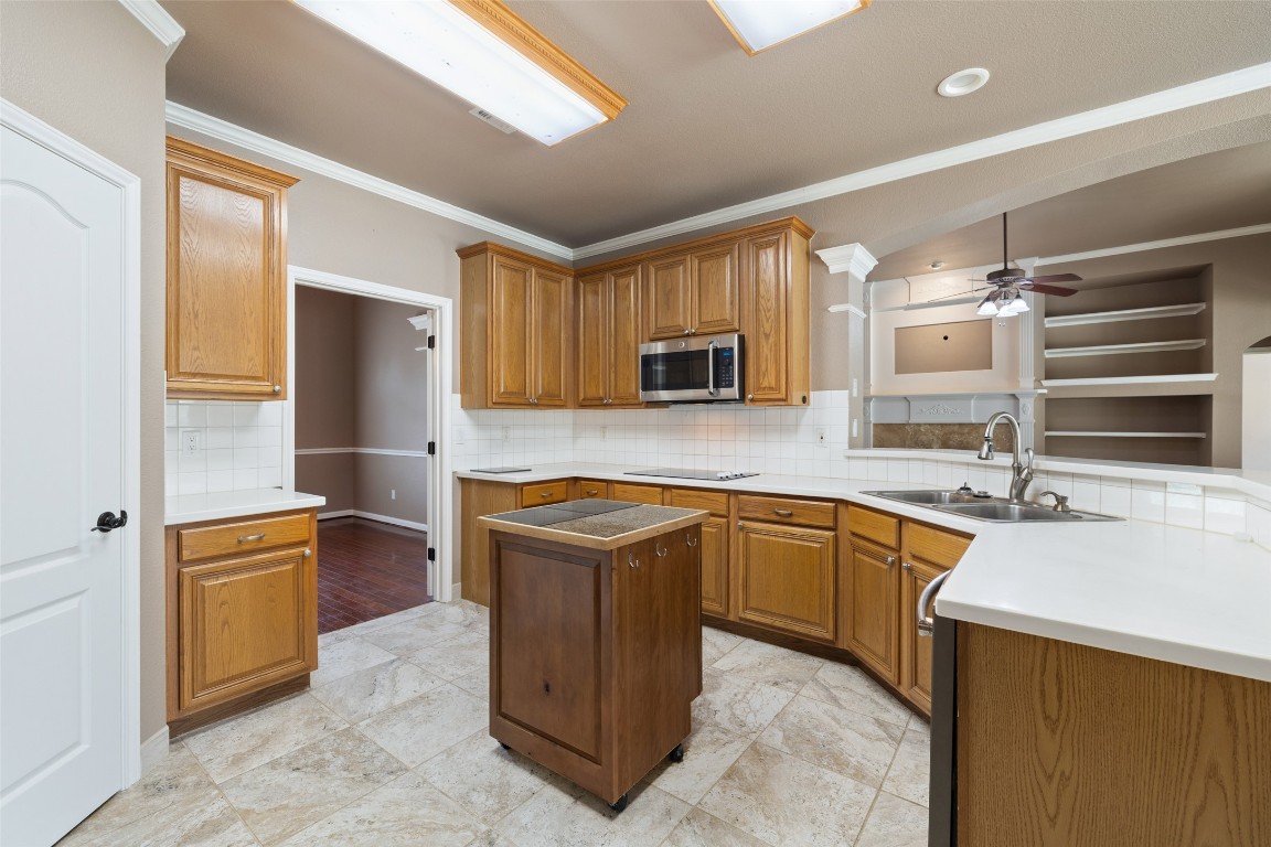 270 Rollin N Ranch Road Blanco, TX 78606 - Photo 22 of 27 a kitchen with stainless steel appliances granite countertop a sink and cabinets