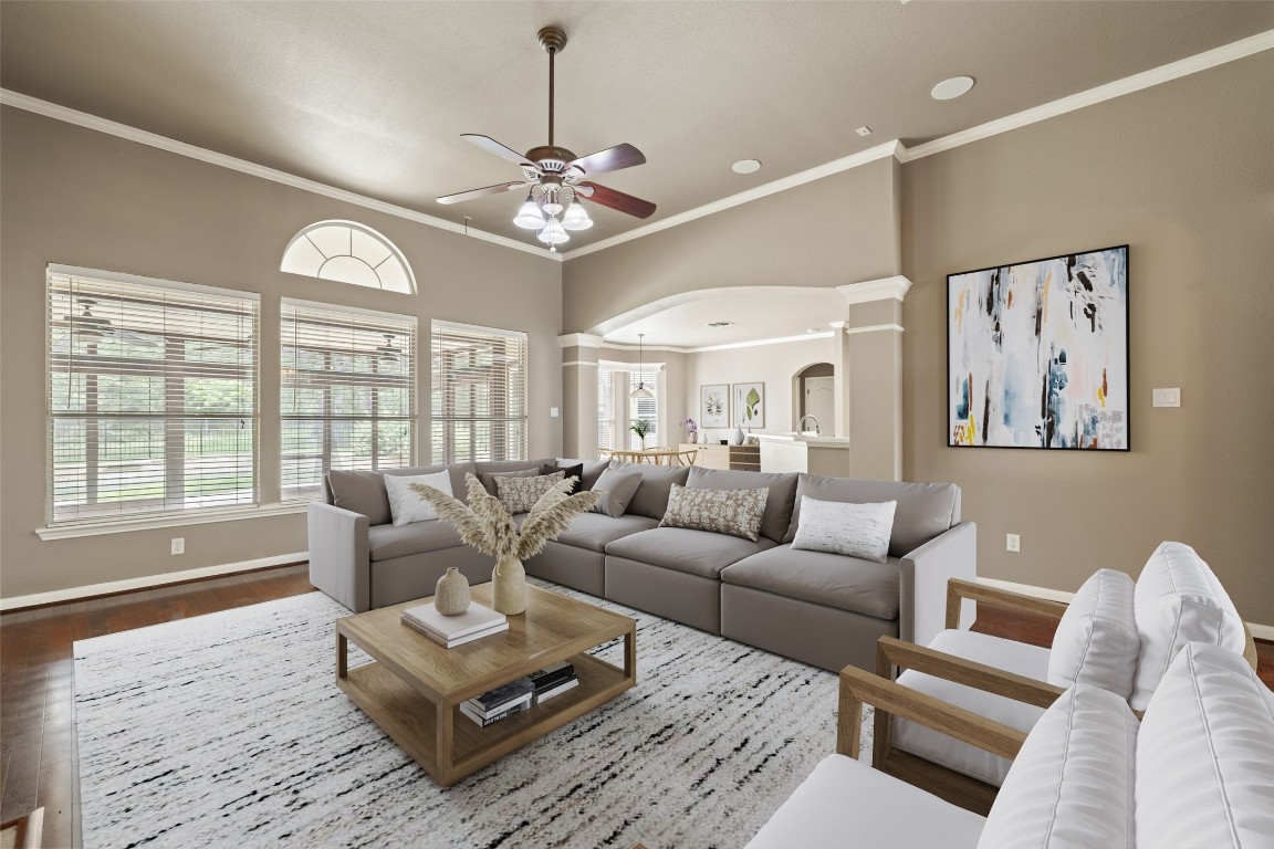 270 Rollin N Ranch Road Blanco, TX 78606 - Photo 8 of 27 a living room with furniture chandelier and a large window