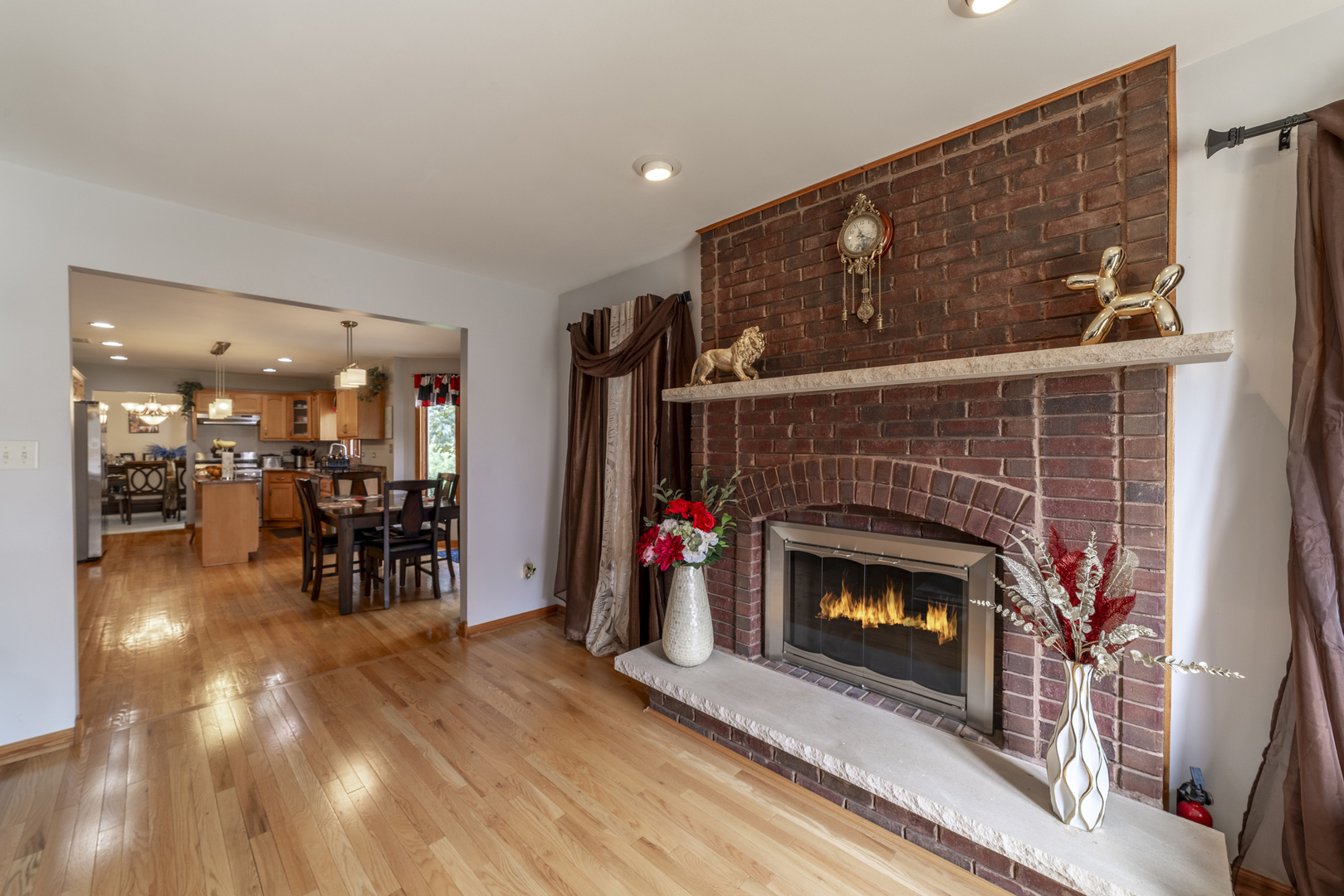 1071 Yamma Ridge New Lenox, IL 60451 - Photo 17 of 51 a living room with furniture and a fireplace