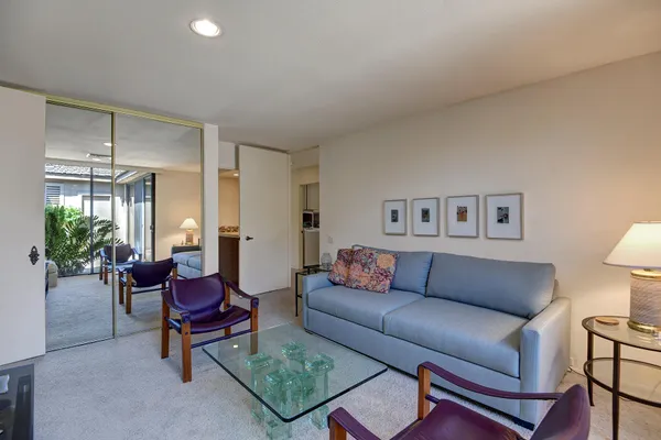 a living room with furniture and a window