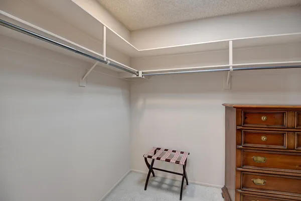 a view of a room with racks on the wall