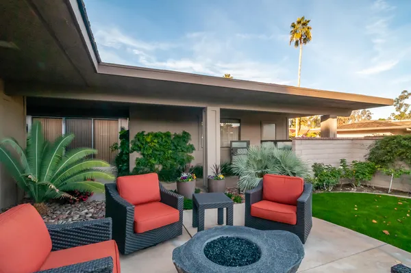 a outdoor living space with furniture and garden view