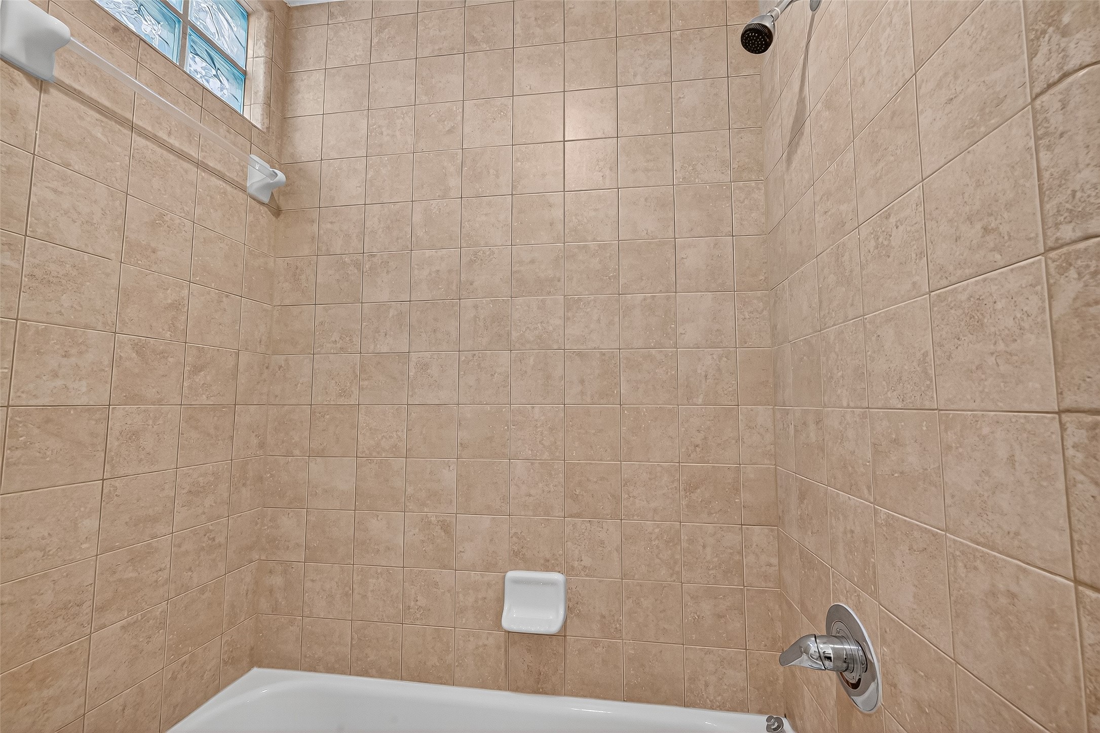 2710 Hullsmith Drive, Unit 1303 Houston, TX 77063 - Photo 13 of 25 a bathroom with a shower