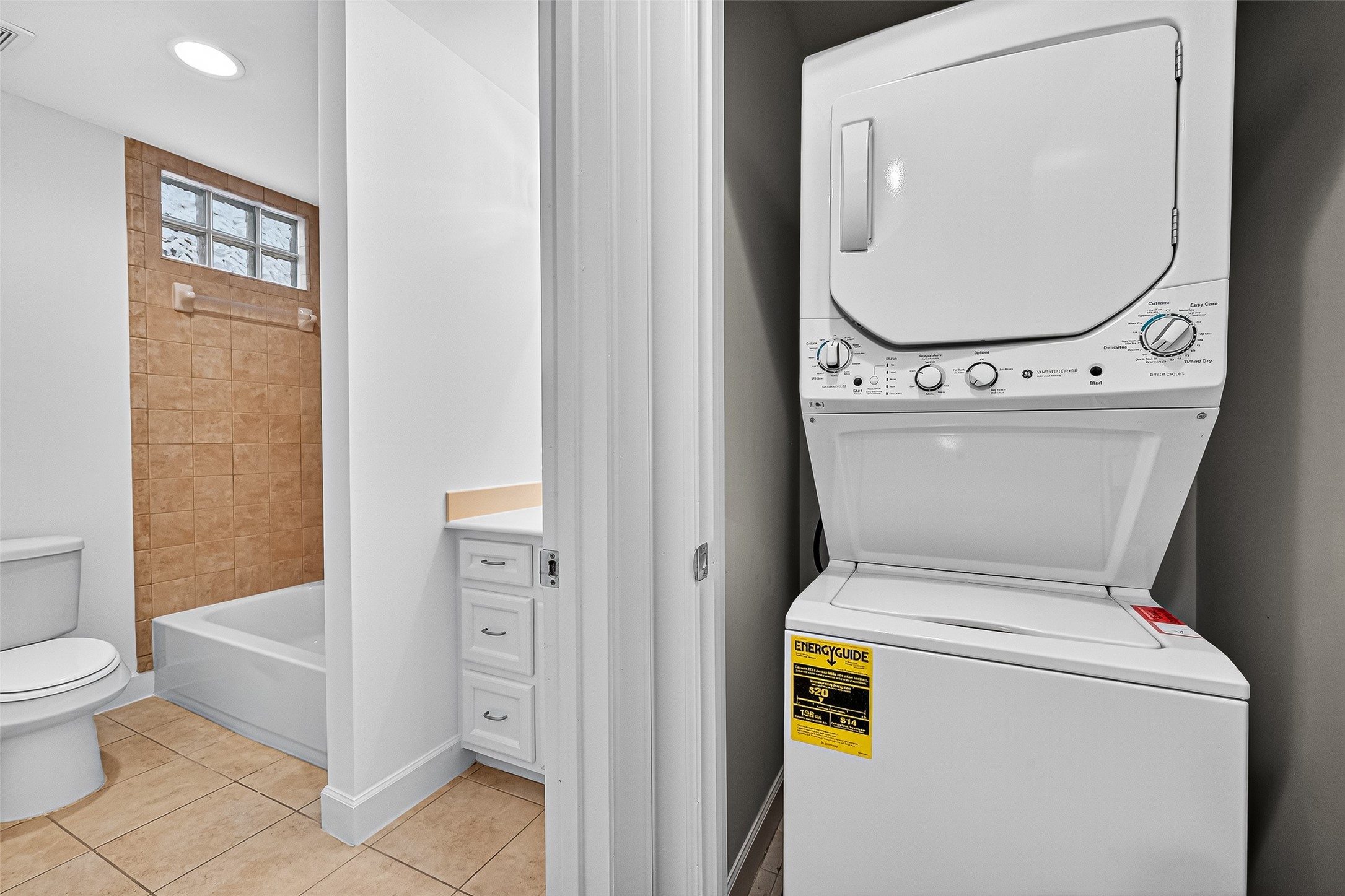 2710 Hullsmith Drive, Unit 1303 Houston, TX 77063 - Photo 14 of 25 a utility room with dryer and washer