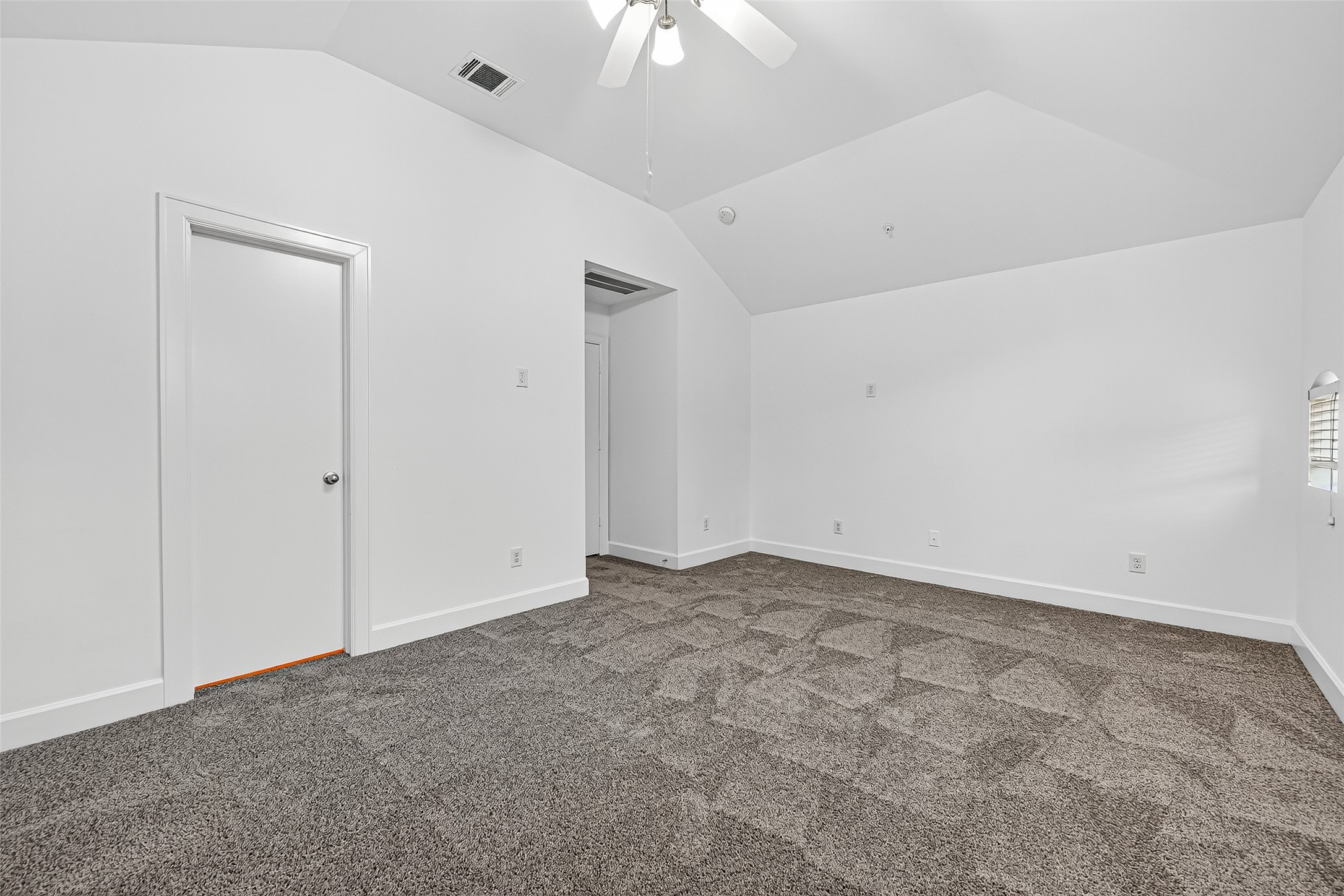 2710 Hullsmith Drive, Unit 1303 Houston, TX 77063 - Photo 18 of 25 an empty room with a chandelier fan