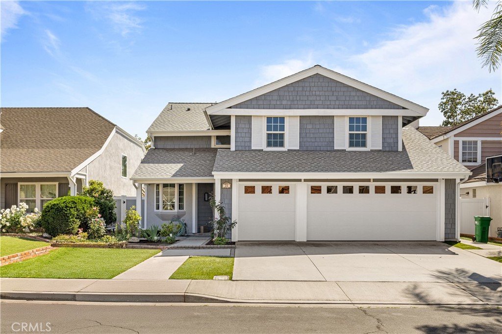20 Grant Irvine, CA 92620 - Photo 1 of 1 a front view of a house with a yard and garage