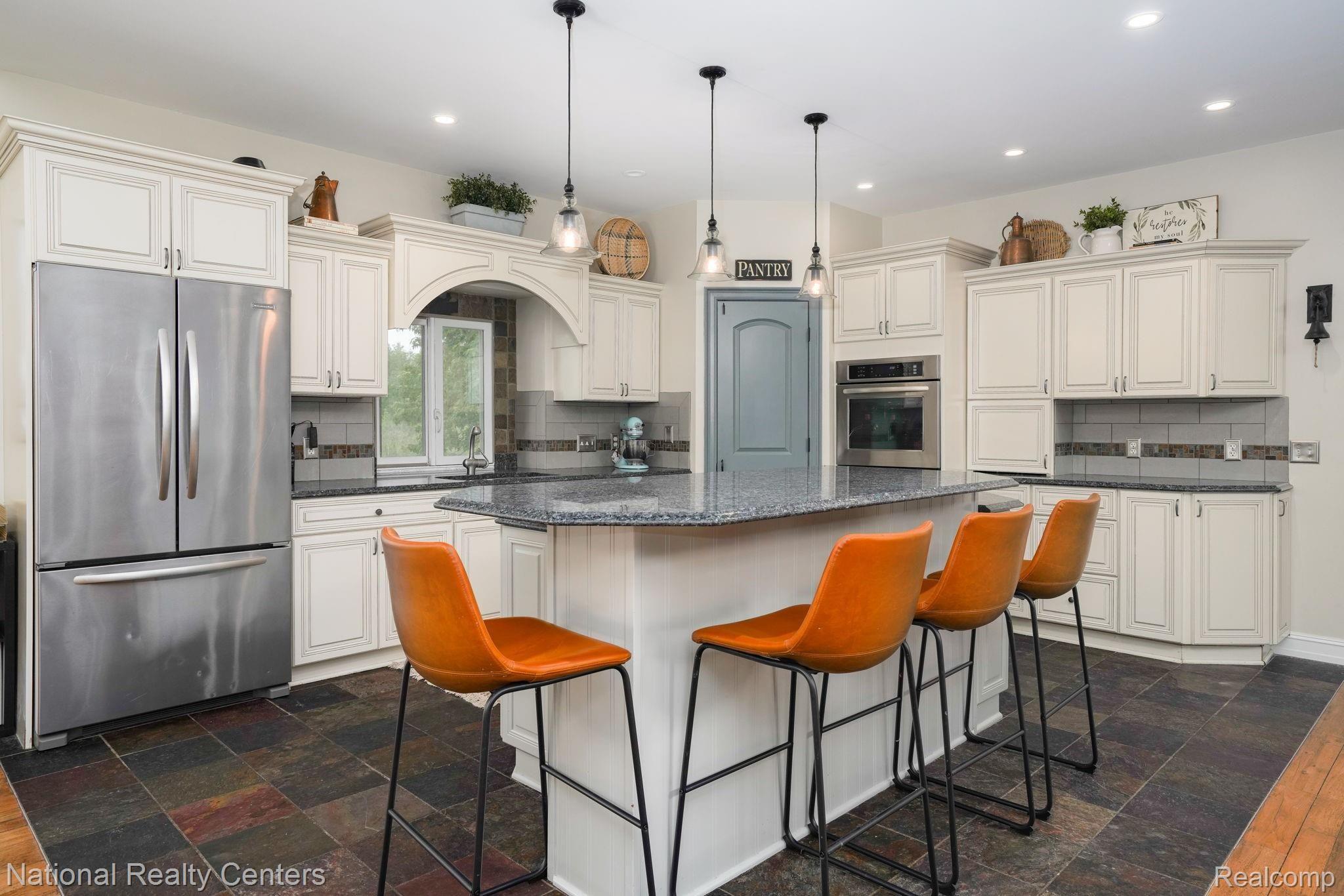 1280 Inwood Road Rochester, MI 48306 - Photo 15 of 47 Plenty of seating at island