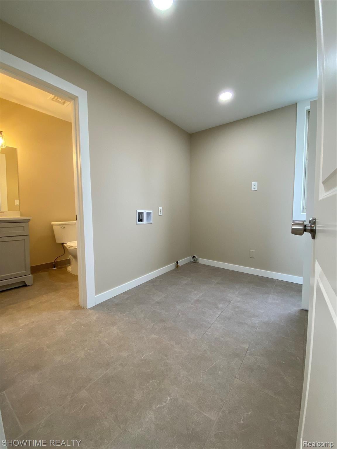 5039 East 9 Mile Road Warren, MI 48091 - Photo 7 of 25 First-Floor Laundry Room