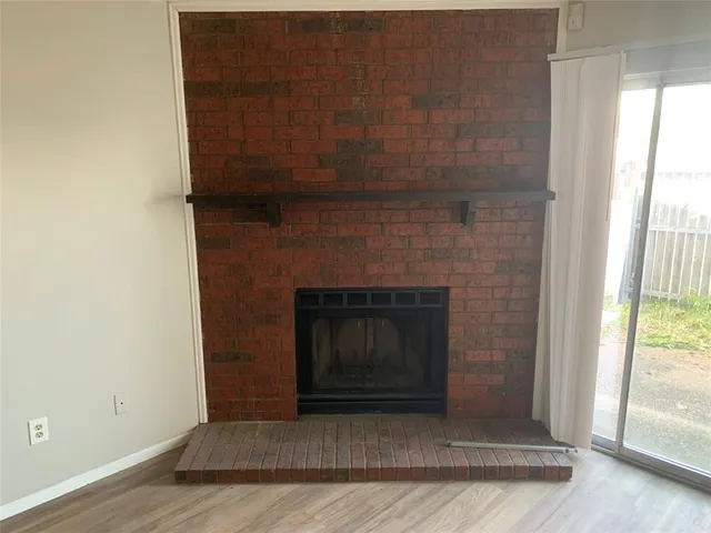 a living room with a fireplace in it