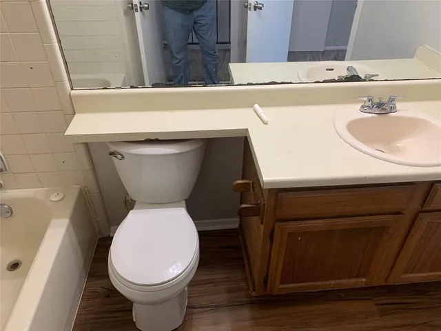a bathroom with a sink and a toilet