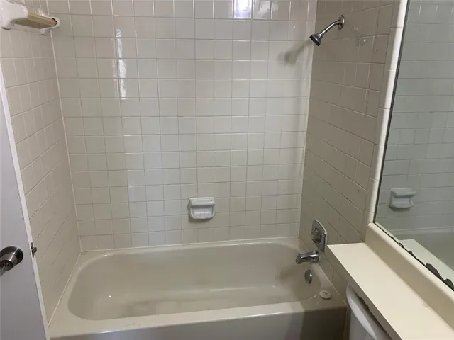 a close up of a bathtub in a bathroom