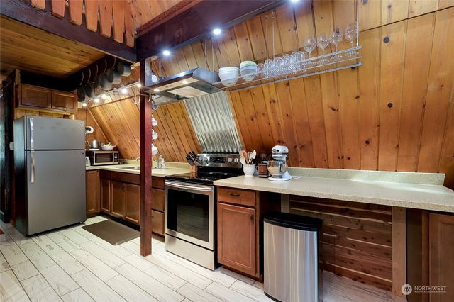 a view of a chairs and table in a patio