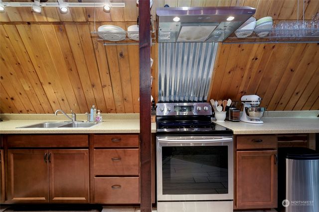 a view of a chairs and table in a patio
