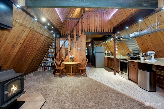 a view of balcony with furniture