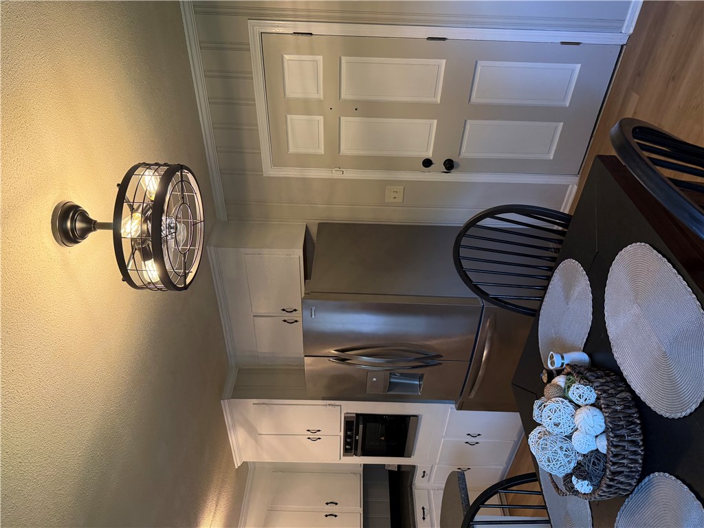 2008 Bolt Drive Anderson, SC 29621 - Photo 4 of 23 Gleaming stainless steel appliances complement the warm wood flooring and traditional cabinetry.