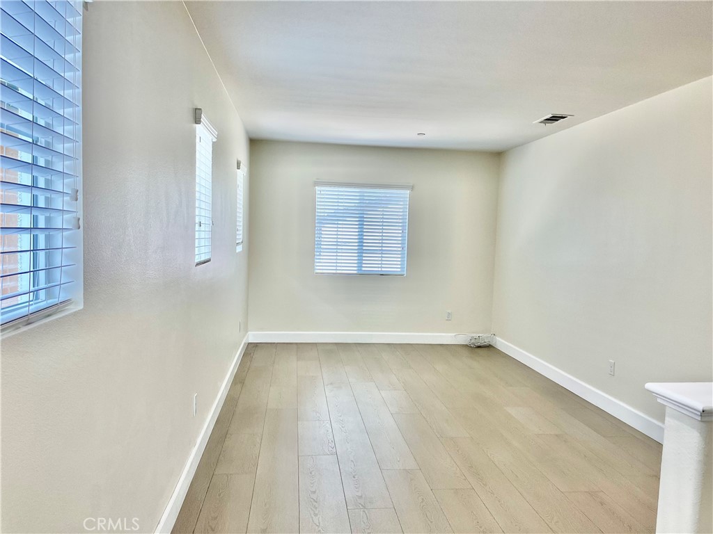 736 Tangelo Way Fullerton, CA 92832 - Photo 11 of 36 a view of an empty room with a window