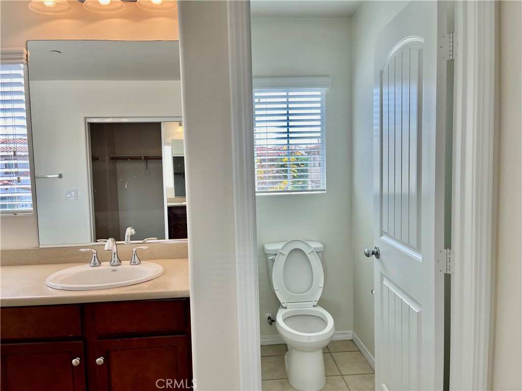 736 Tangelo Way Fullerton, CA 92832 - Photo 21 of 36 a bathroom with a sink toilet and shower