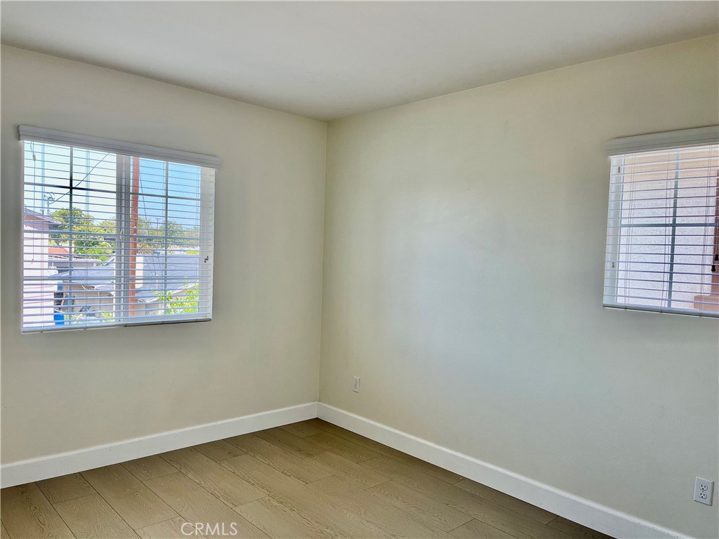 736 Tangelo Way Fullerton, CA 92832 - Photo 22 of 36 an empty room with a window