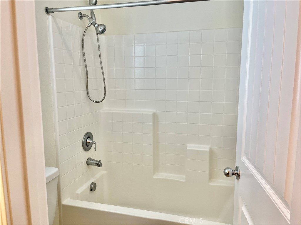 736 Tangelo Way Fullerton, CA 92832 - Photo 27 of 36 a bathroom with a bath tub with a shower