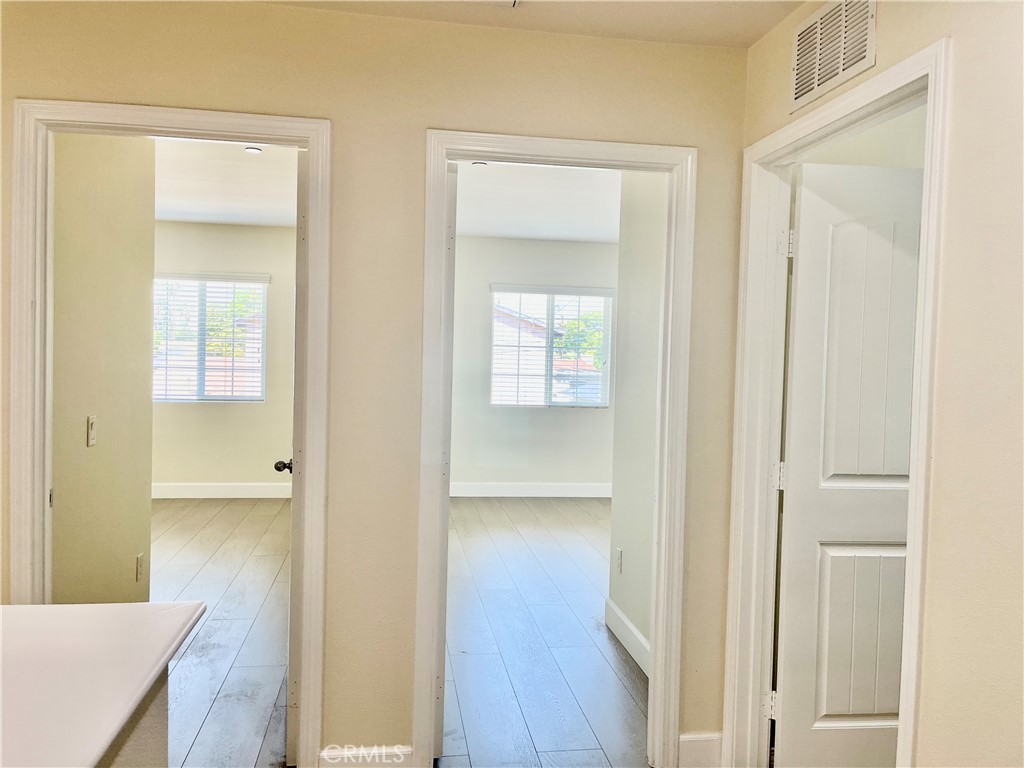 736 Tangelo Way Fullerton, CA 92832 - Photo 28 of 36 a view of a bathroom from a hallway