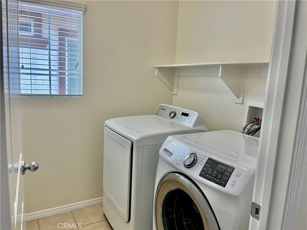 736 Tangelo Way Fullerton, CA 92832 - Photo 29 of 36 a utility room with dryer and washer