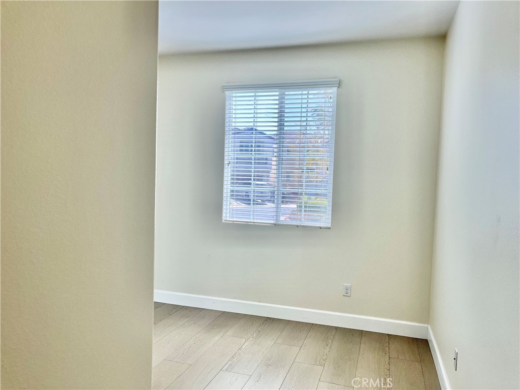 736 Tangelo Way Fullerton, CA 92832 - Photo 4 of 36 an empty room with a window