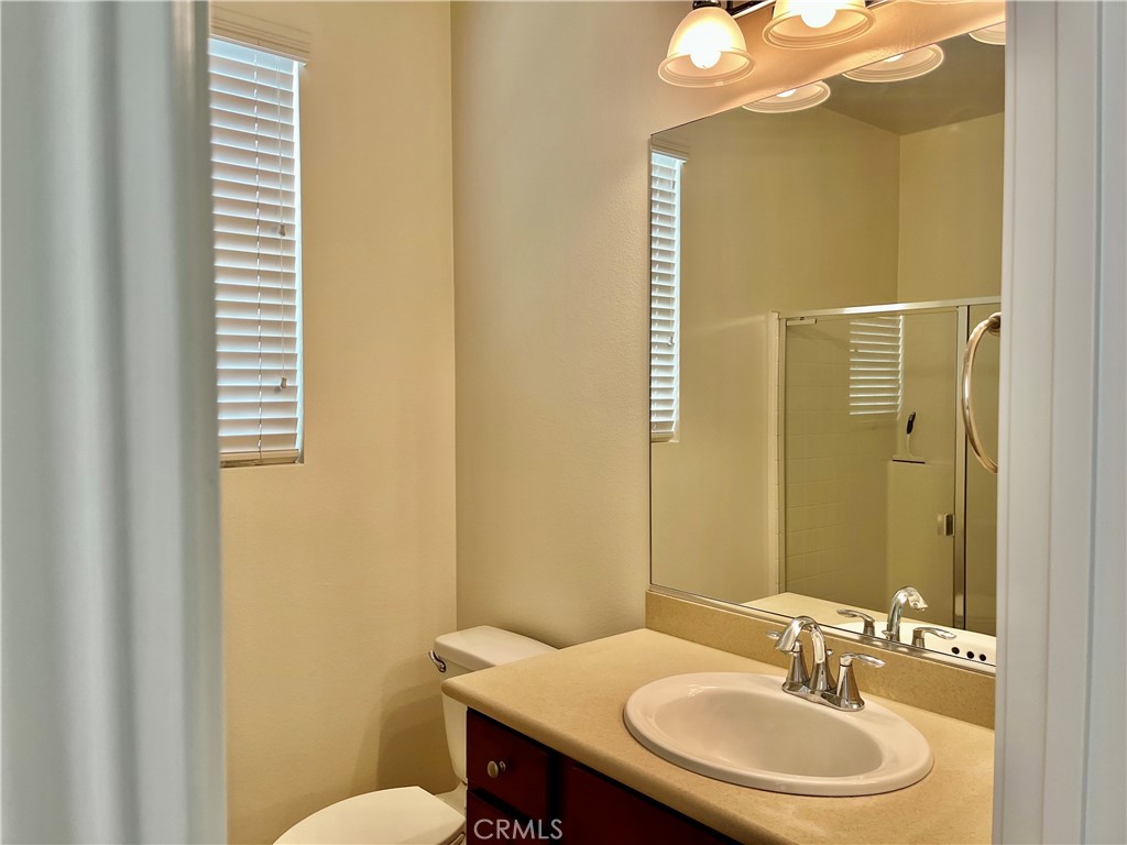 736 Tangelo Way Fullerton, CA 92832 - Photo 6 of 36 a bathroom with a sink and a mirror