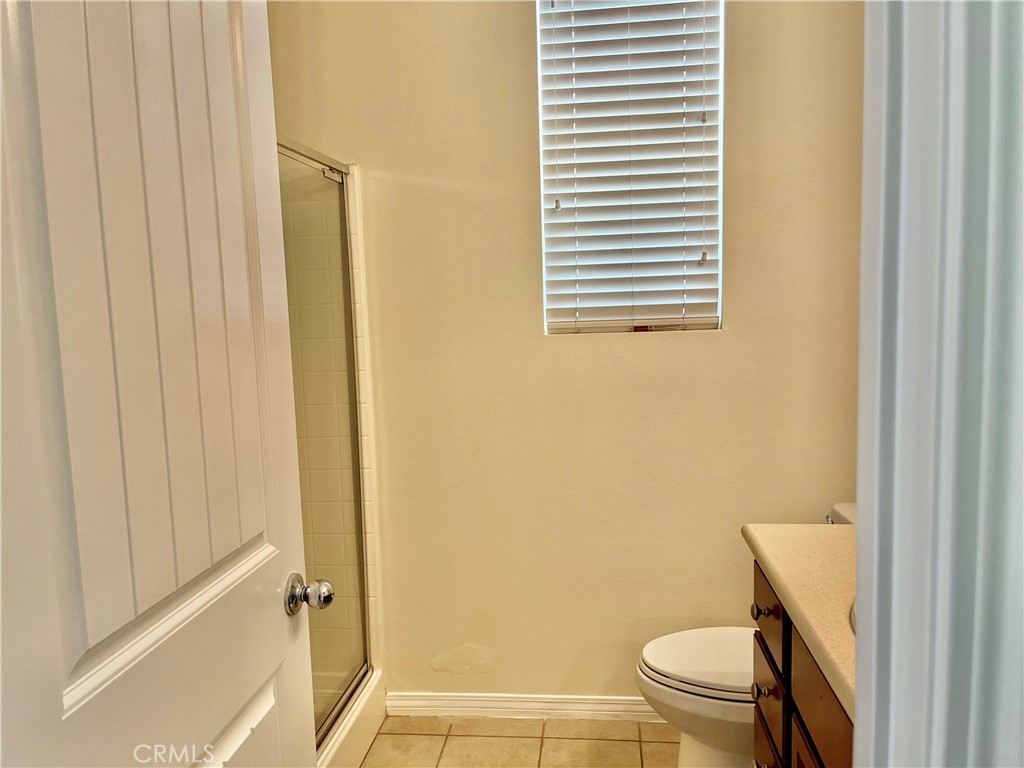 736 Tangelo Way Fullerton, CA 92832 - Photo 7 of 36 a bathroom with a toilet and a shower