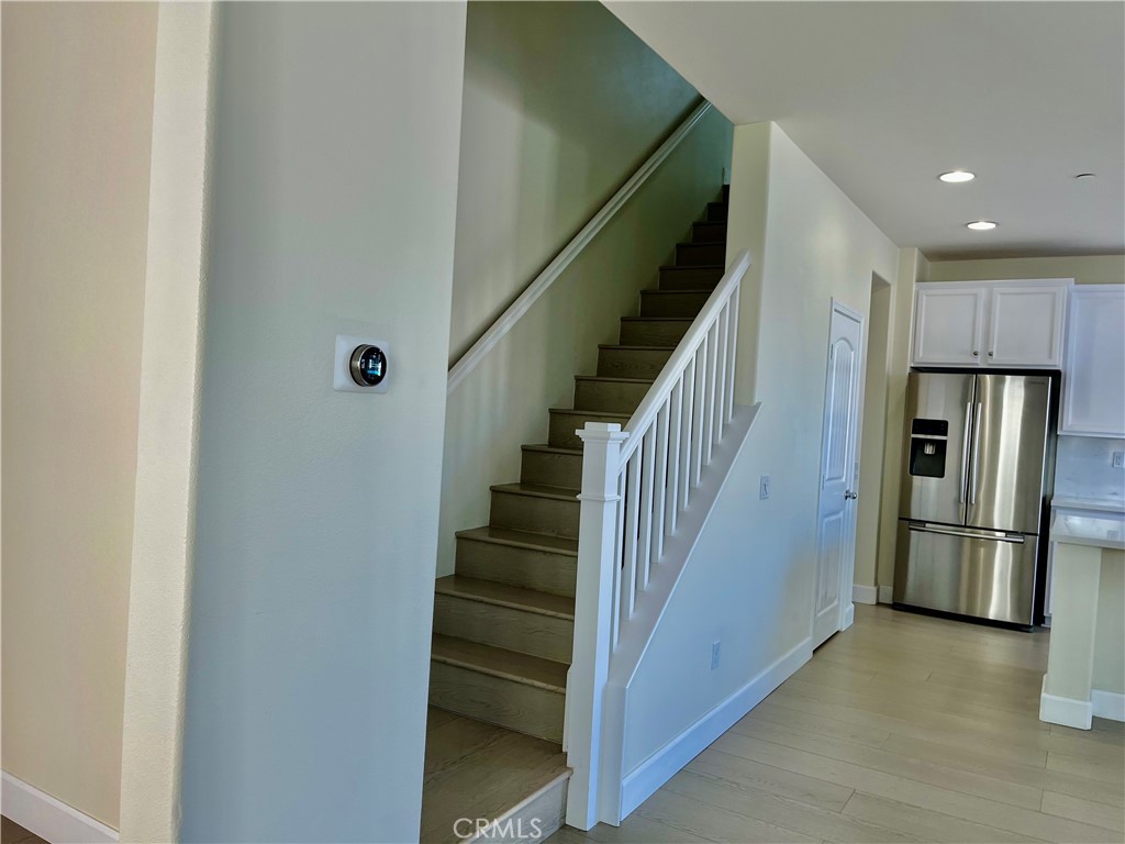 736 Tangelo Way Fullerton, CA 92832 - Photo 9 of 36 a view of hallway with stairs