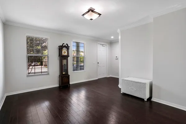 a kitchen with stainless steel appliances granite countertop wooden cabinets and a stove top oven