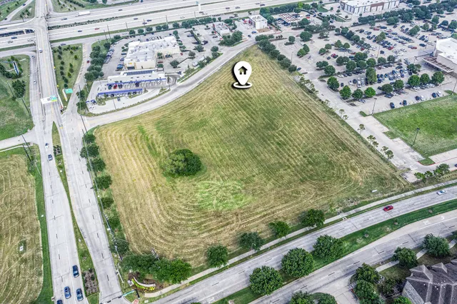 a view of swimming pool from a balcony