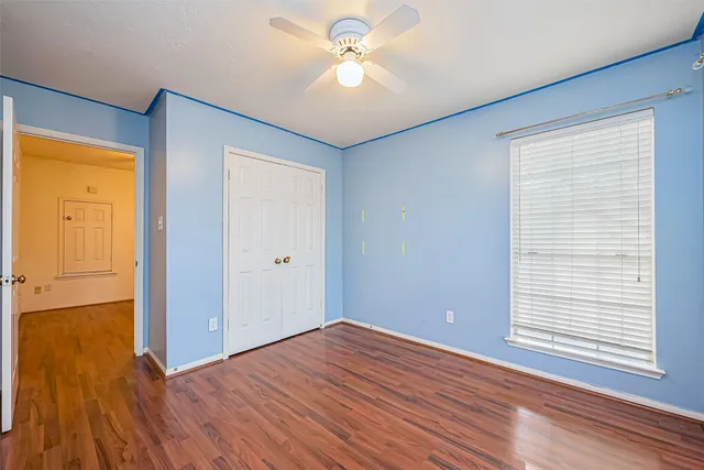 a bathroom with a bathtub and toilet