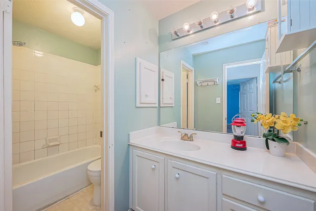 a view of a chairs and table in a patio