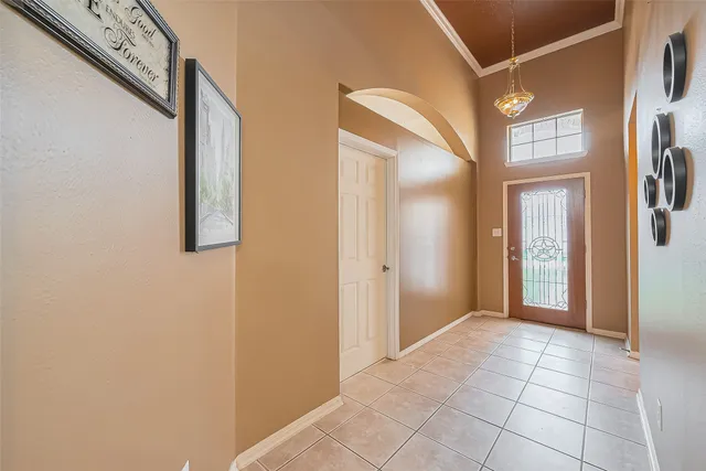 a living room with stainless steel appliances kitchen island granite countertop furniture a sink a stove a kitchen island and chairs