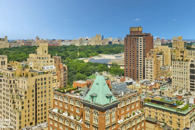 a view of a city with tall buildings