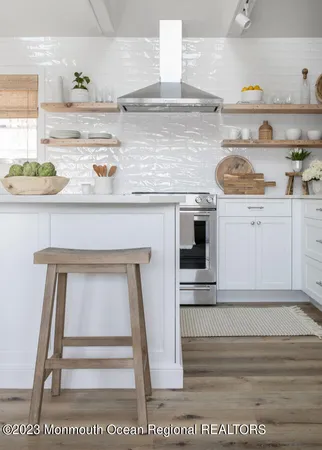a kitchen with a cabinets and window