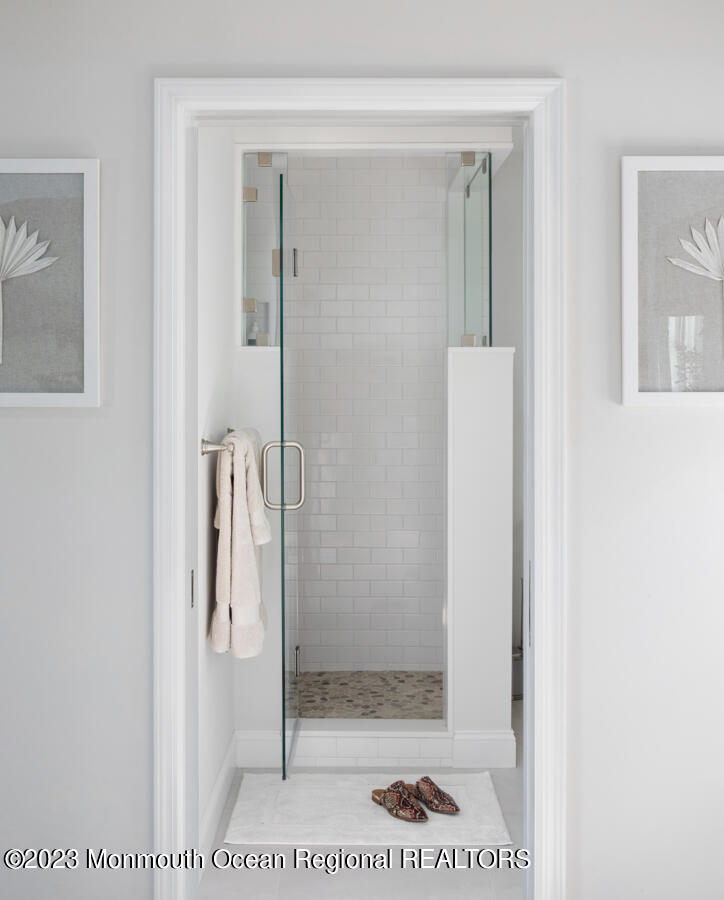 76 Bridge Avenue, Unit REAR COTTAGE Point Pleasant Beach, NJ 08742 - Photo 6 of 13 a bathroom with a shower