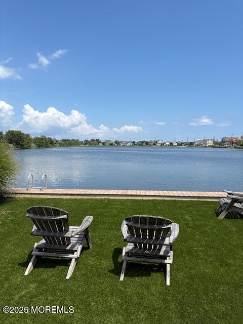 76 Bridge Avenue, Unit REAR COTTAGE Point Pleasant Beach, NJ 08742 - Photo 10 of 13 a view of a lake with furniture