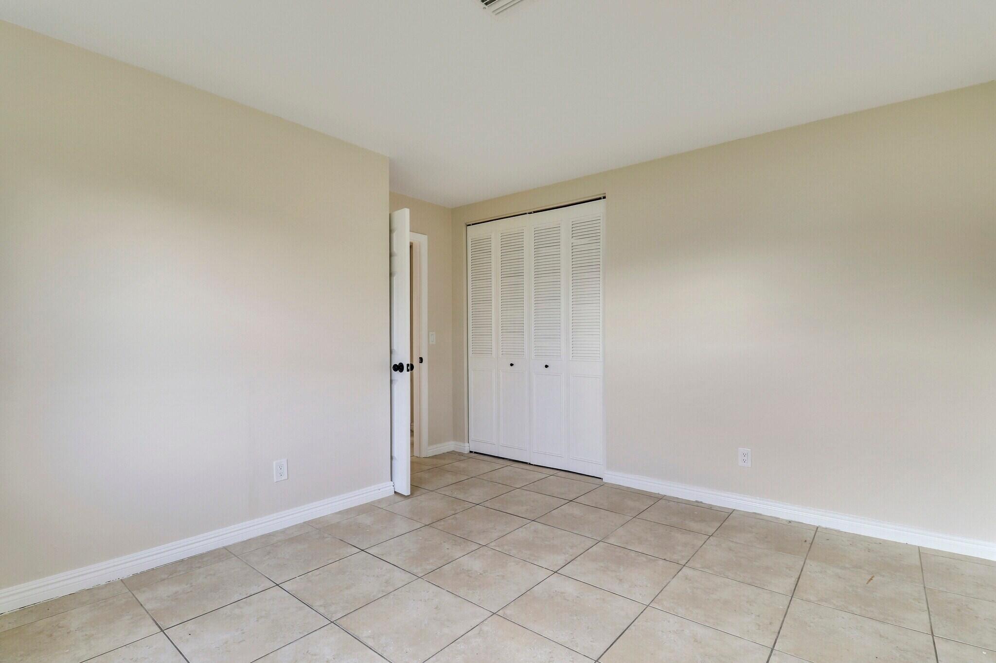 2777 Southeast Normand Street Stuart, FL 34997 - Photo 9 of 14 a view of an empty room