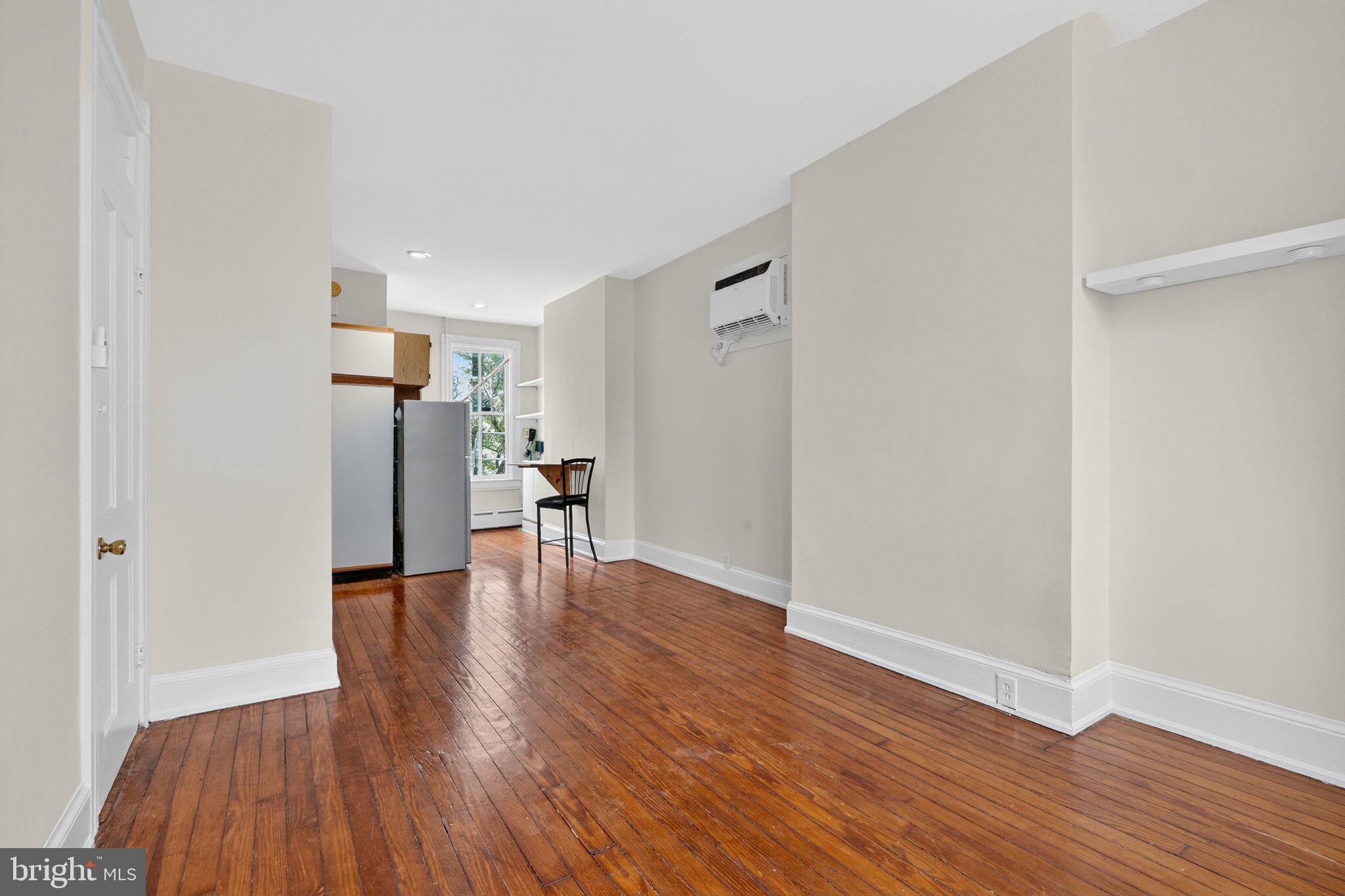 15 3rd Street Northeast, Unit 5 Washington, DC 20002 - Photo 12 of 24 a view of empty room with wooden floor