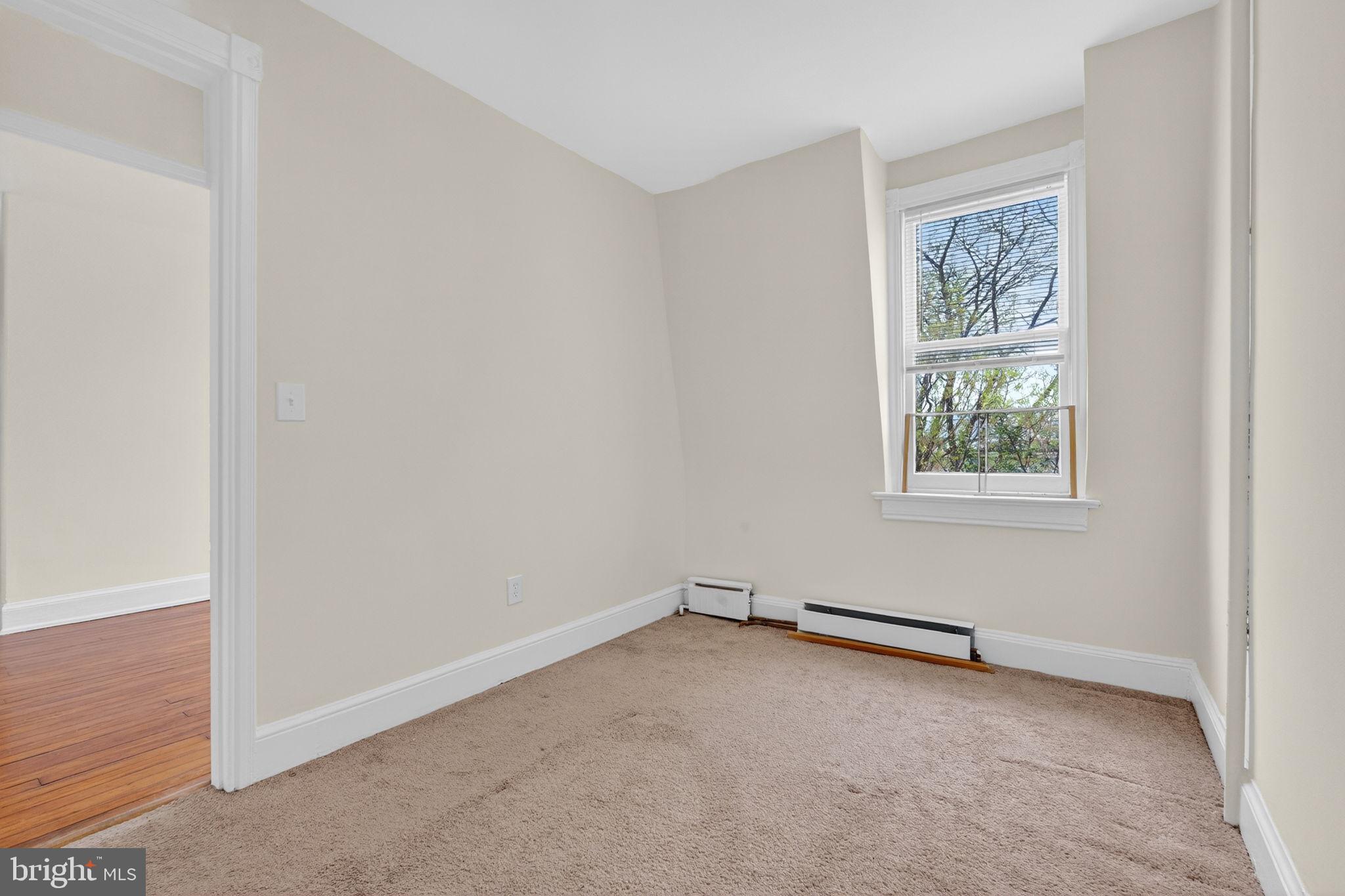 15 3rd Street Northeast, Unit 5 Washington, DC 20002 - Photo 20 of 24 an empty room with a window