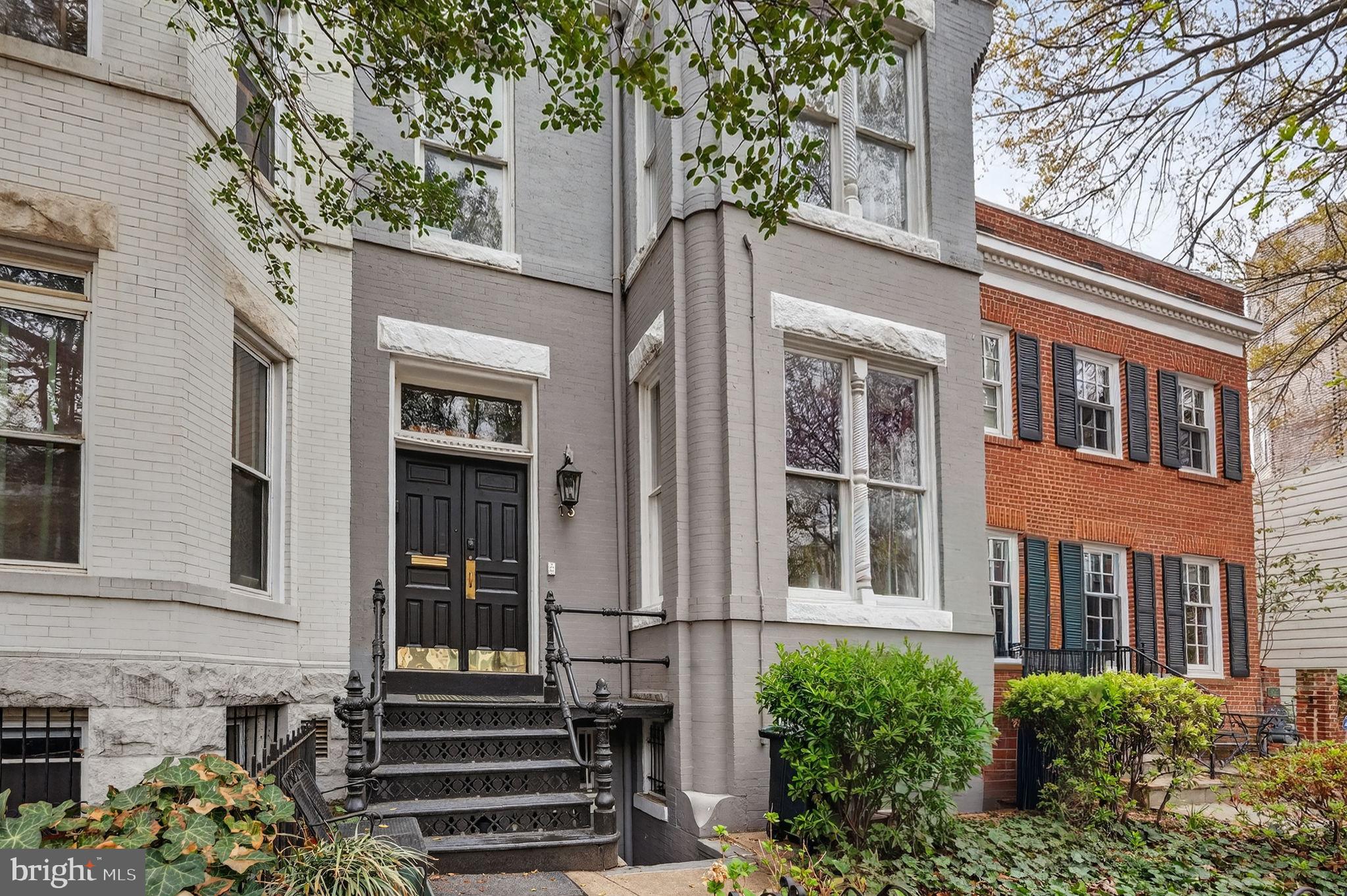 15 3rd Street Northeast, Unit 5 Washington, DC 20002 - Photo 4 of 24 a front view of a house with a garden