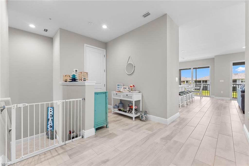 2609 Seychelles Circle, Unit 1608 Naples, FL 34112 - Photo 26 of 35 a very nice looking room with a large window