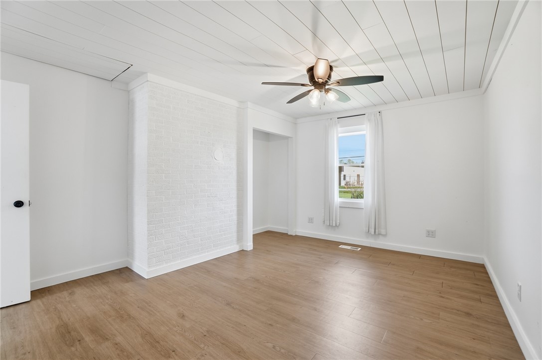3991 Benner Road Miamisburg, OH 45342 - Photo 20 of 44 Bright and airy, this room features a charming exposed brick wall and durable flooring.