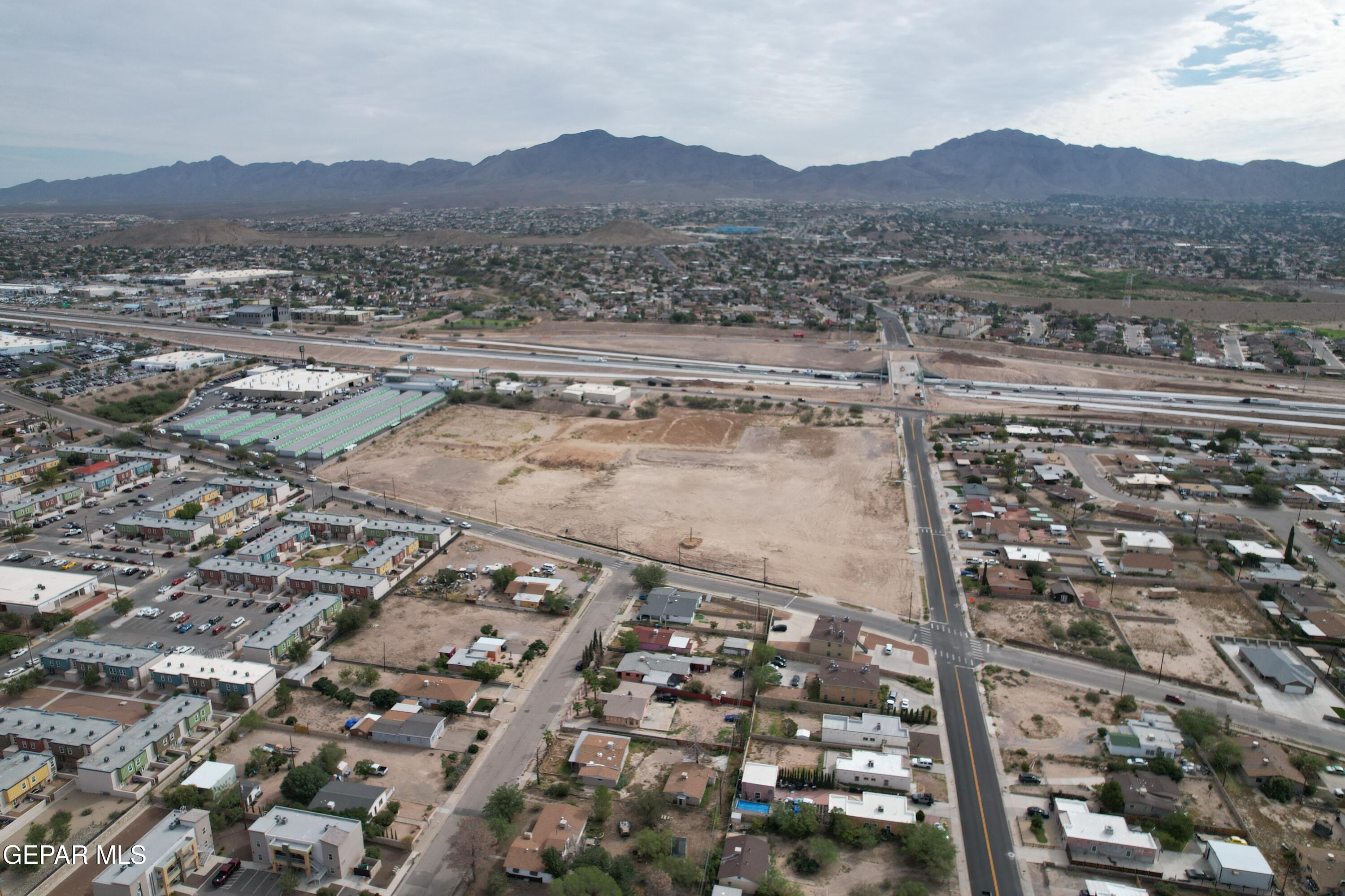 5352 Ridge Street El Paso, TX 79932 - Photo 6 of 7 an aerial view of residential house and sandy dunes