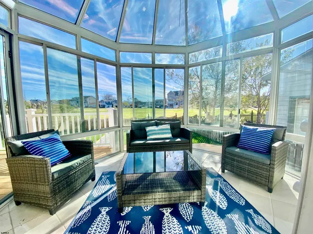 a view of a bedroom with wooden floor